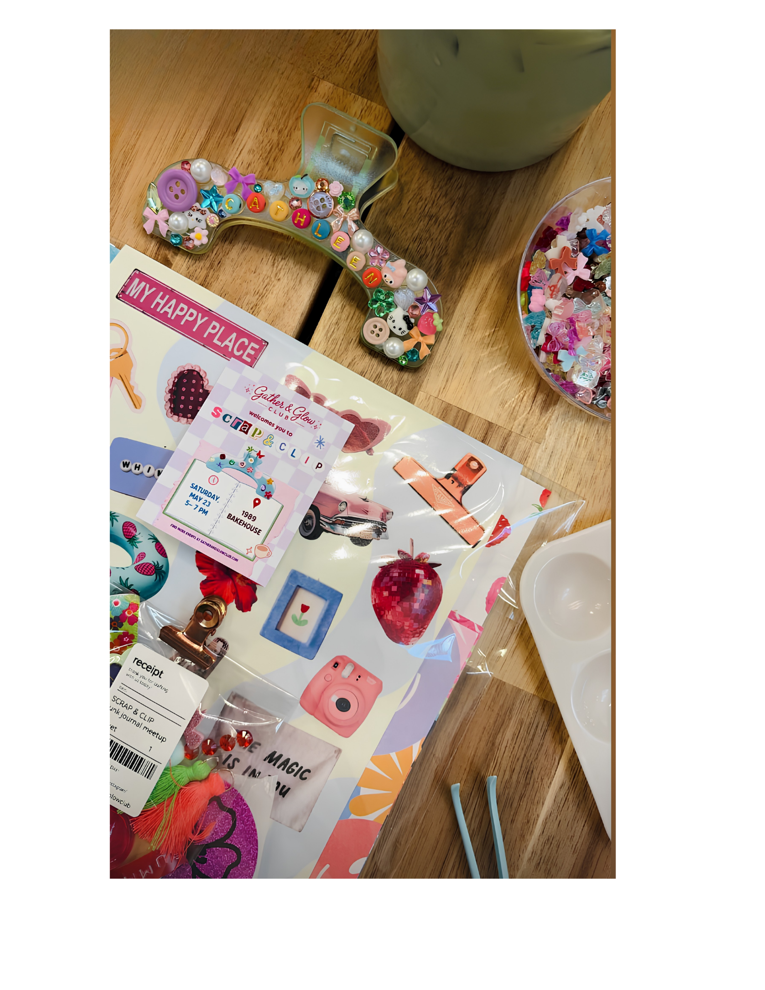 Colorful scrapbook and charm supplies arranged on a craft table
